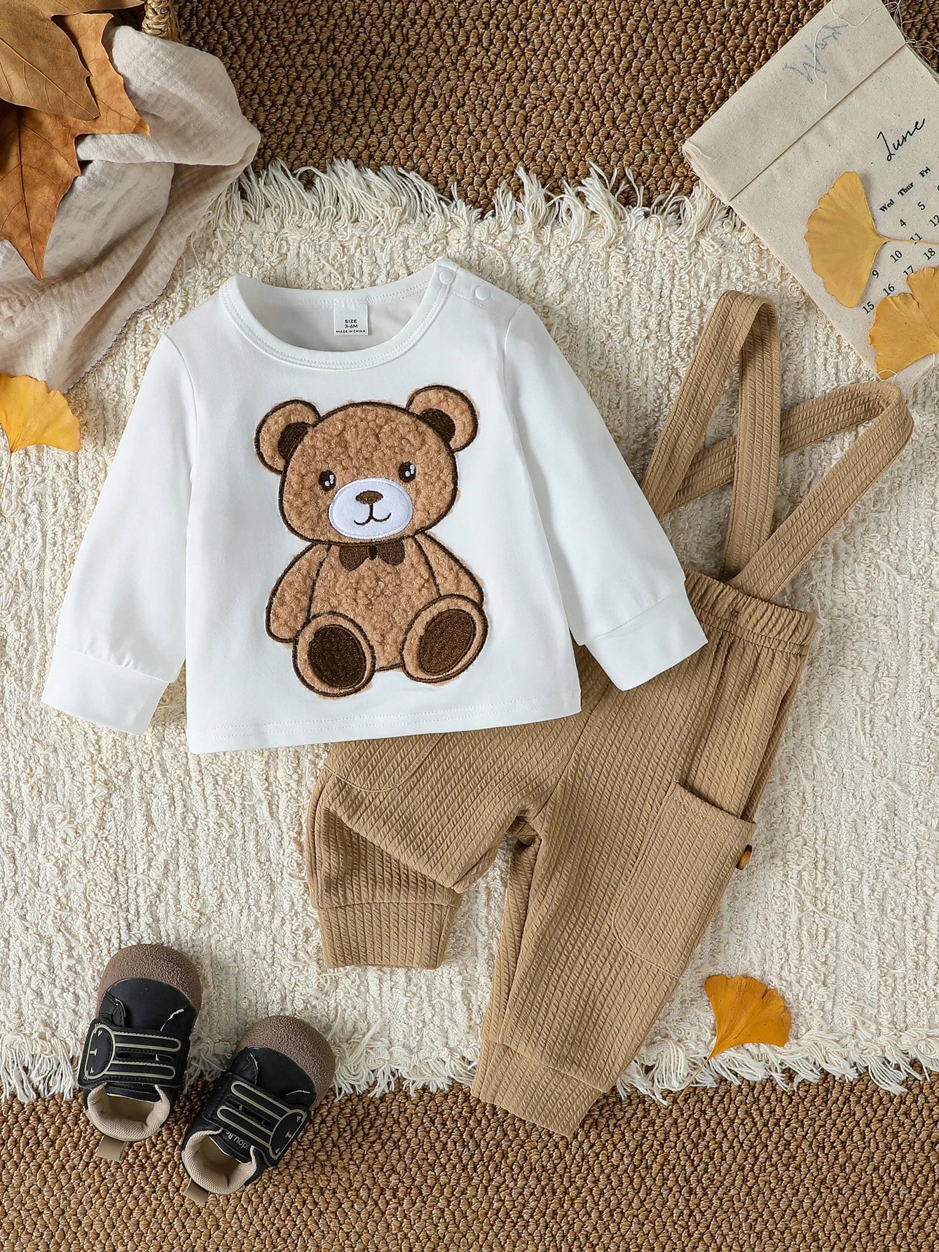 Alternative angle of baby boys bear top and button overalls set