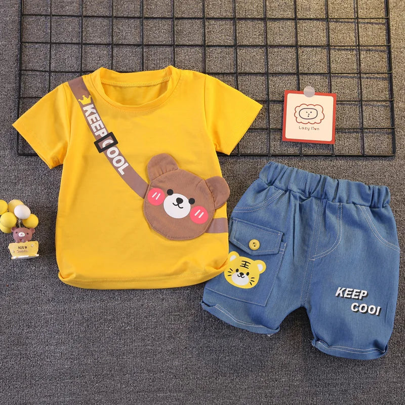 Detail view showing the fabric finish and pattern of the boys cartoon bear t-shirt and shorts set