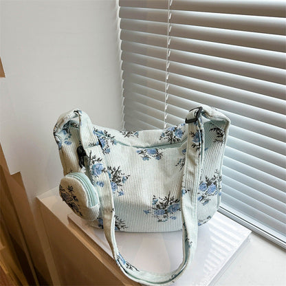 Soft women's messenger bag - dumpling bag with floral print, canvas, casual everyday use