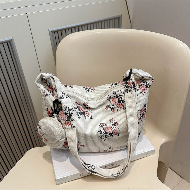 Soft women's messenger bag - dumpling bag with floral print, canvas, casual everyday use