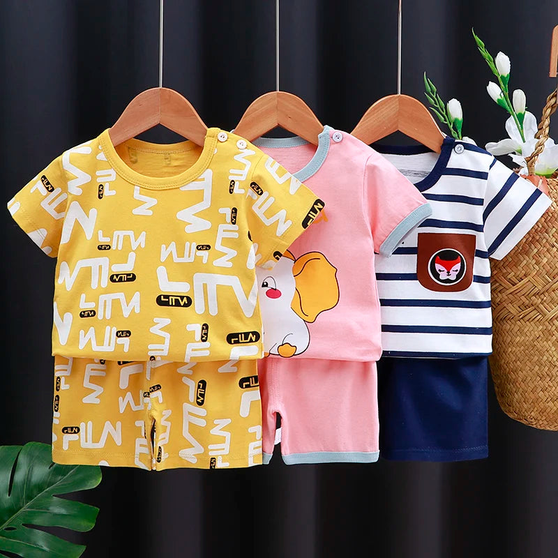 Close up highlighting the hem and stitching on the kids cartoon t-shirt and shorts casual set