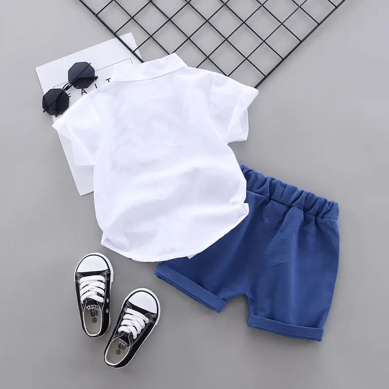 Style angle showing the baby boys dinosaur t-shirt and shorts set - view 3