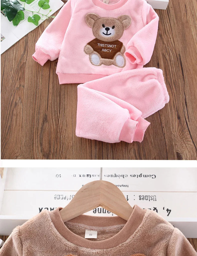 Back or secondary profile shot of the kids flannel fleece cartoon bear pyjama set