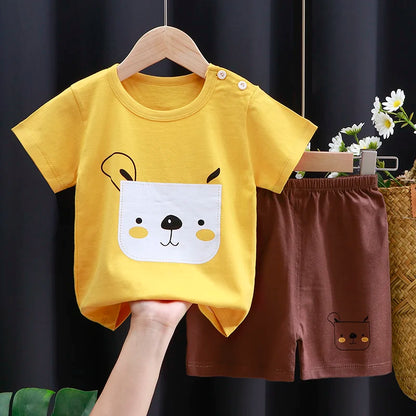 Focus on the neckline and sleeve features of the kids cartoon t-shirt and shorts casual set