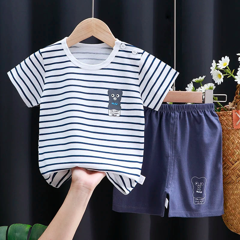 Occasion style layout showcasing the kids cartoon t-shirt and shorts casual set
