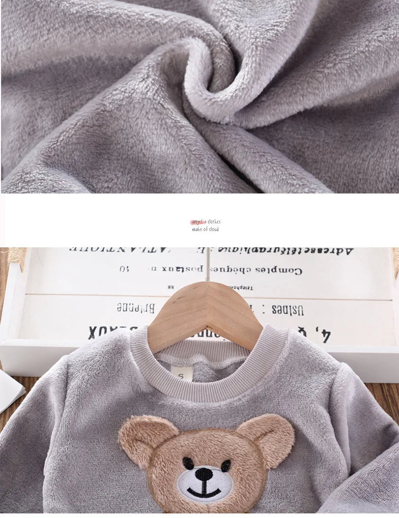 Back or secondary profile shot of the kids flannel fleece cartoon bear pyjama set