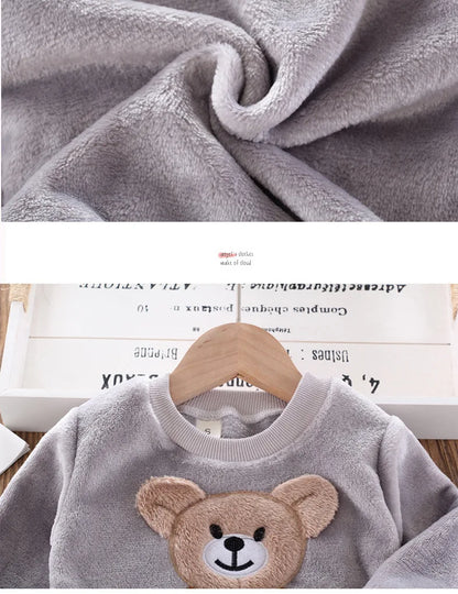 Back or secondary profile shot of the kids flannel fleece cartoon bear pyjama set