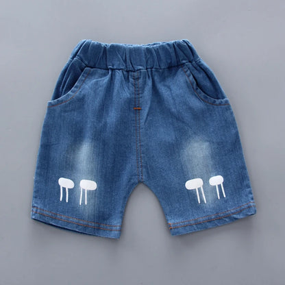 Baby boy wearing a smart casual shirt and denim shorts