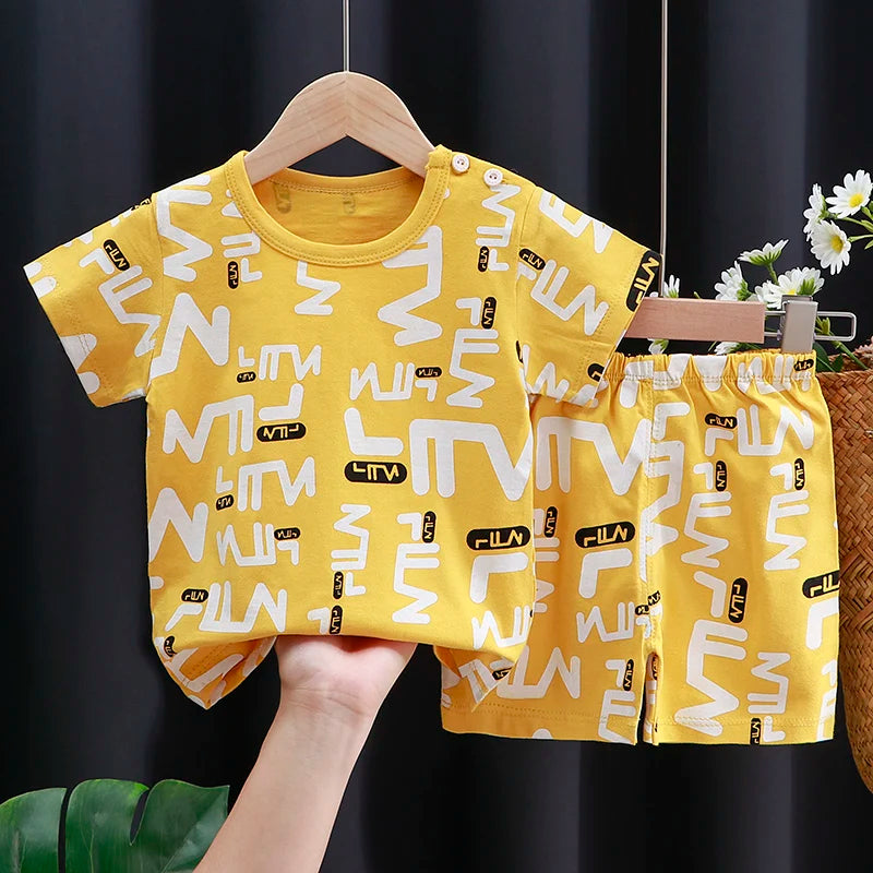Detail view showing the fabric finish and pattern of the kids cartoon t-shirt and shorts casual set