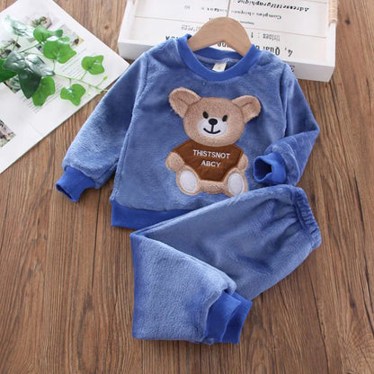 Focus on the neckline and sleeve features of the kids flannel fleece cartoon bear pyjama set