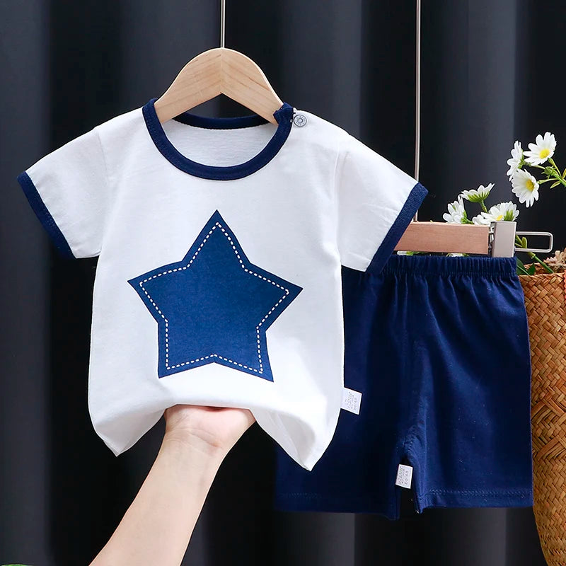 Focus on the neckline and sleeve features of the kids cartoon t-shirt and shorts casual set