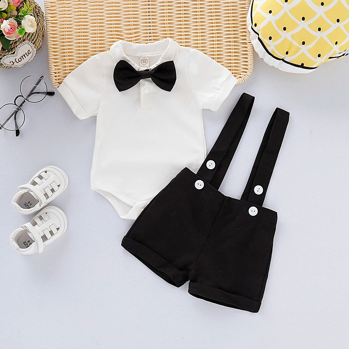 Side view of baby boys formal shirt & shorts romper set