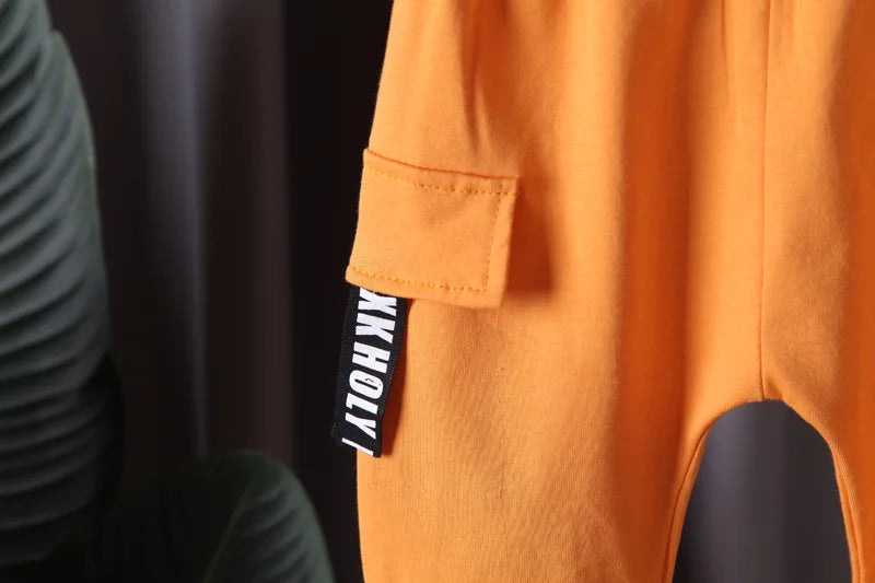 Close up detail of boys summer casual t-shirt & shorts set