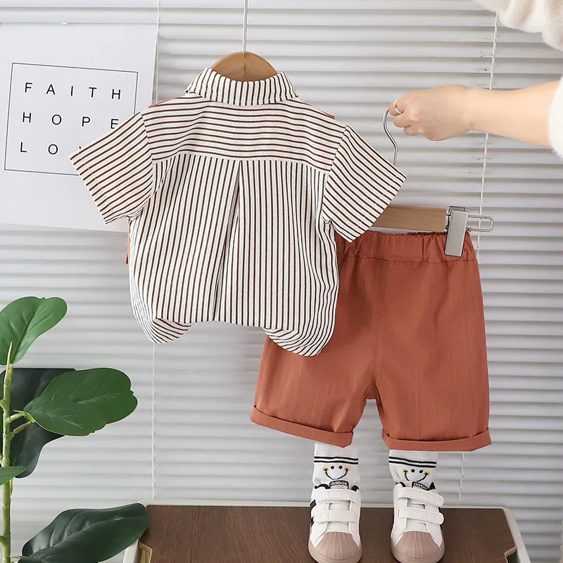 Style angle showing the boys casual summer t-shirt and shorts outfit - view 3