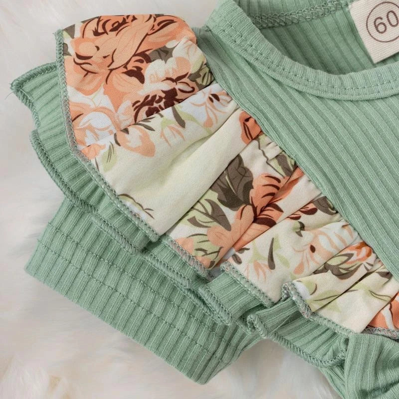 Close up look at the baby girls striped bowknot romper dress - view 10