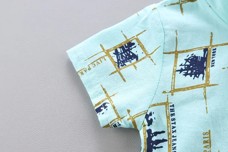 Detail view showing the fabric finish and pattern of the baby boys casual summer top and shorts set