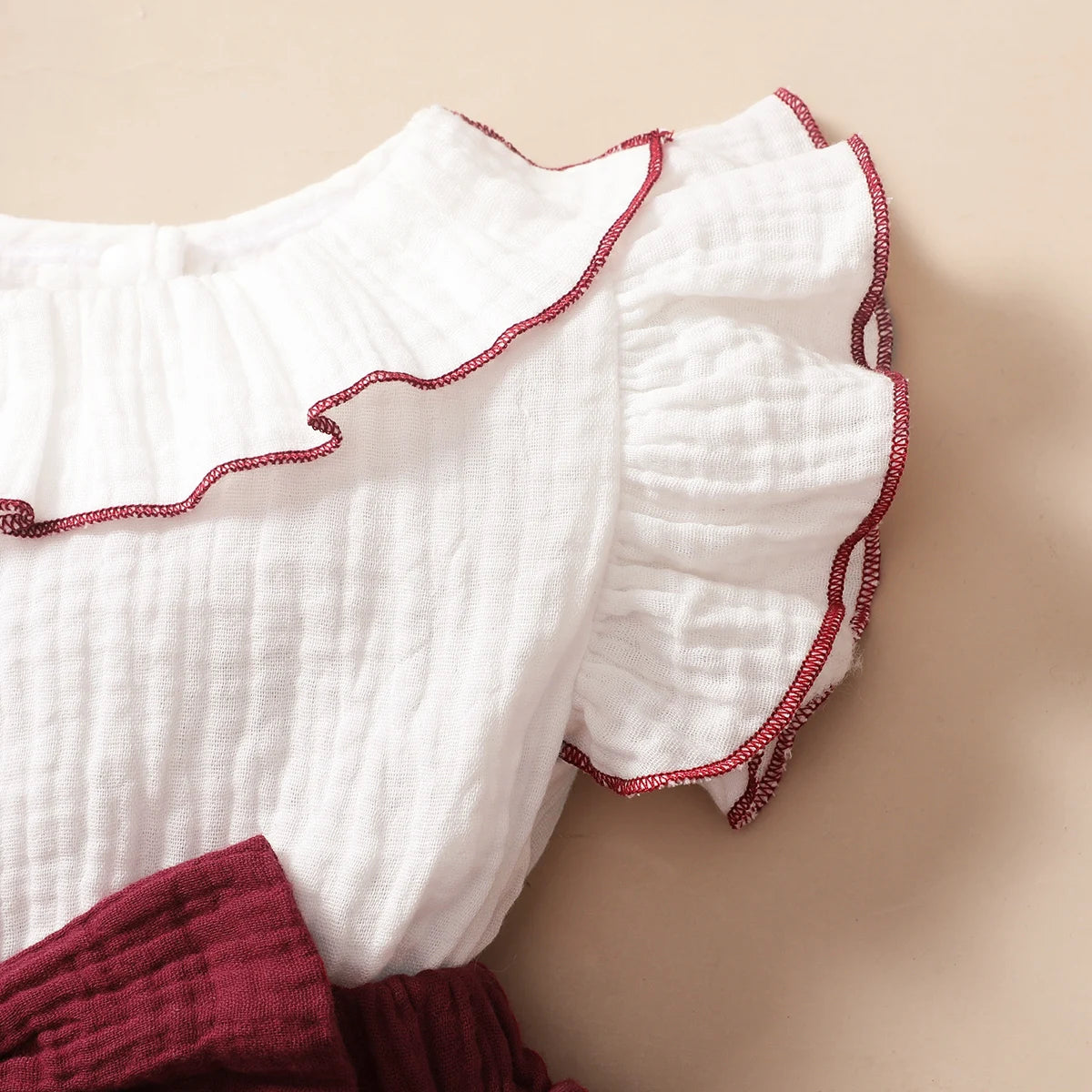 Different viewpoint of the baby girls red wine layered cupcake dress - view 5