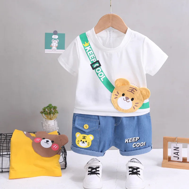 Focus on the neckline and sleeve features of the boys cartoon bear t-shirt and shorts set