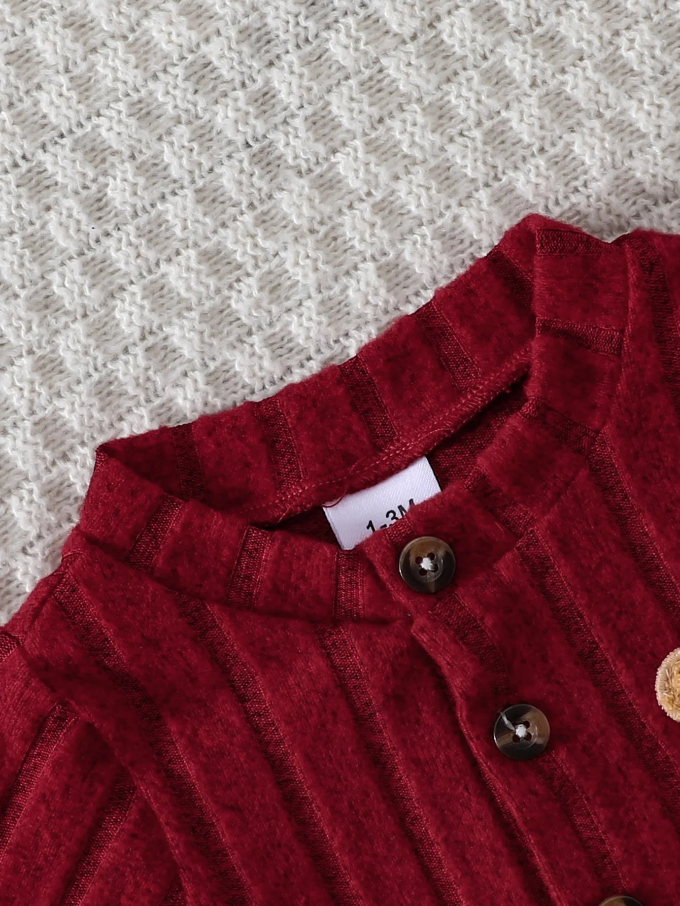 Back view of baby boys red bear badge onesie & hat set