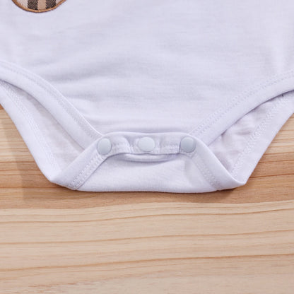 Fabric and texture detail of baby boys plaid bear bodysuit & trousers set