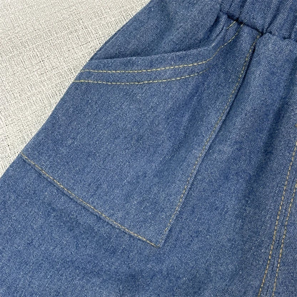 Close-up material detail of baby boys striped short sleeve top and shorts set