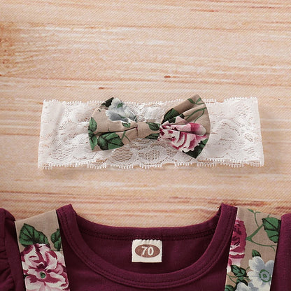 Close up highlighting the hem and stitching on the baby girls christmas floral romper and suspender skirt set