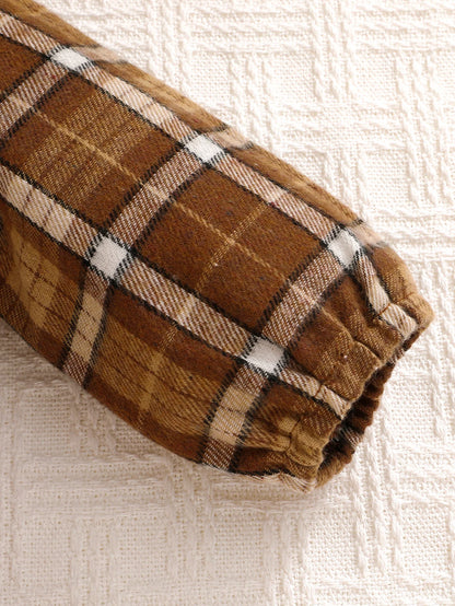 Fabric and texture detail of baby boys plaid jumpsuit with bow tie & beret