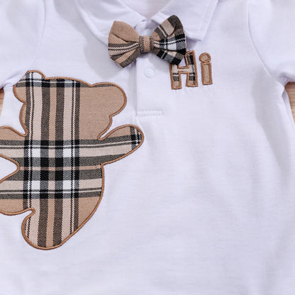 Close up detail of baby boys plaid bear bodysuit & trousers set