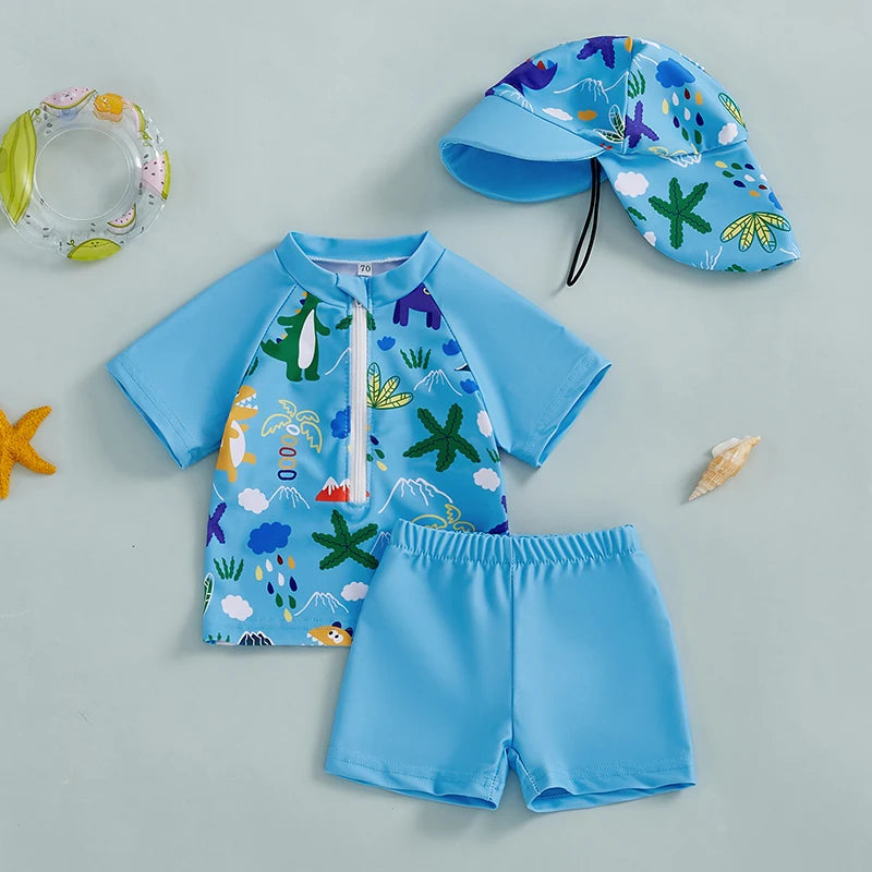 Baby boys three-piece swimwear set with printed rash guard, trunks, and sun hat
