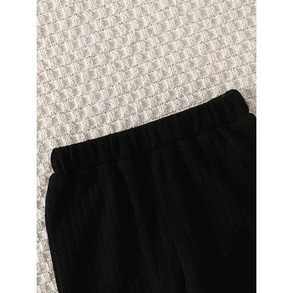 Fabric and texture detail of boys colour block long sleeve top & pants