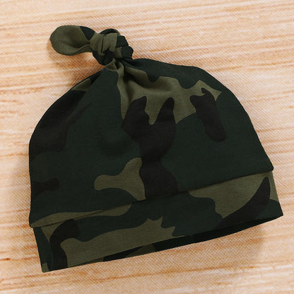 Detail view showing the fabric finish and pattern of the baby boys camouflage shorts and letter print romper set
