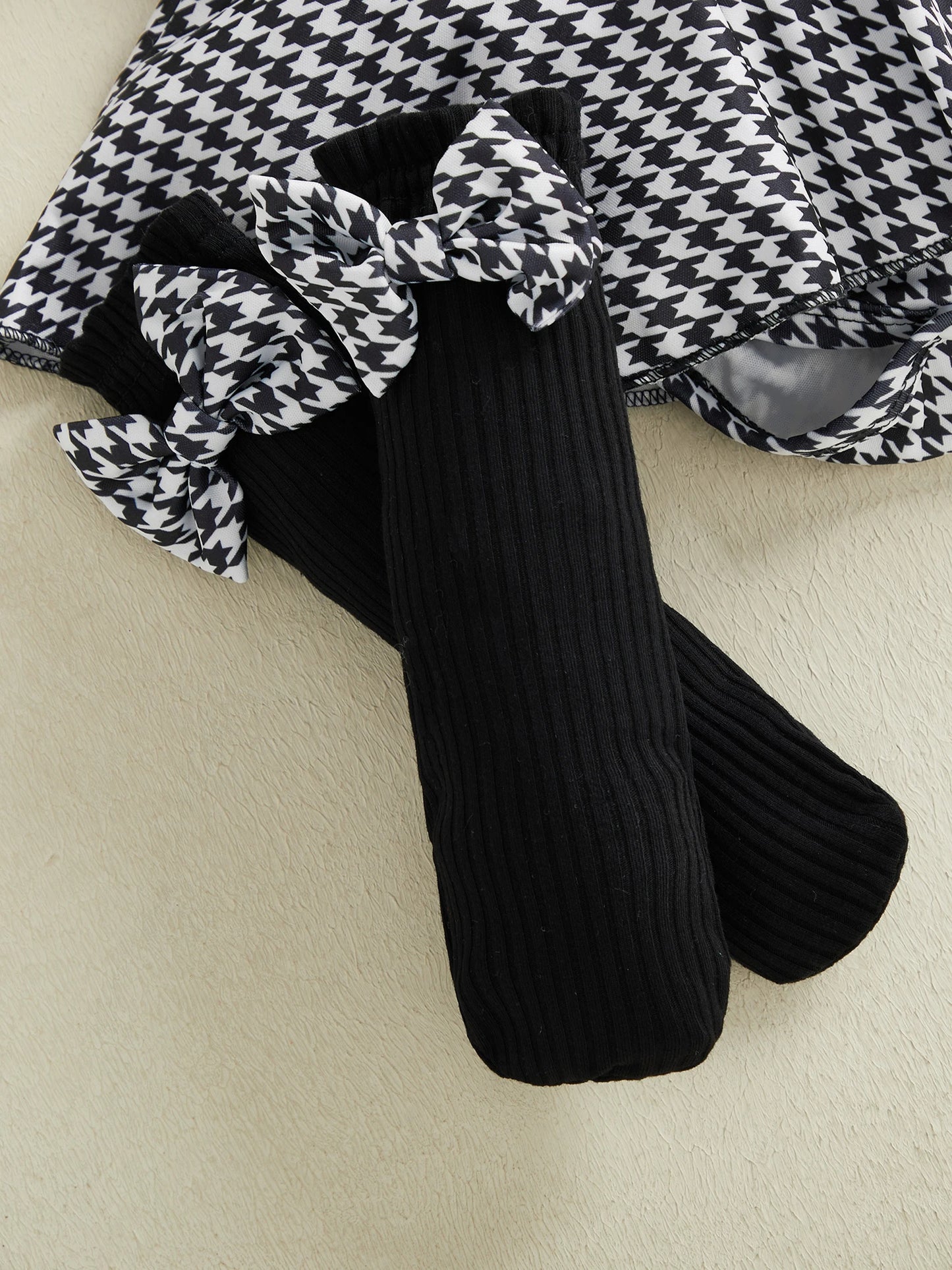 Styling option for baby girls houndstooth romper dress set