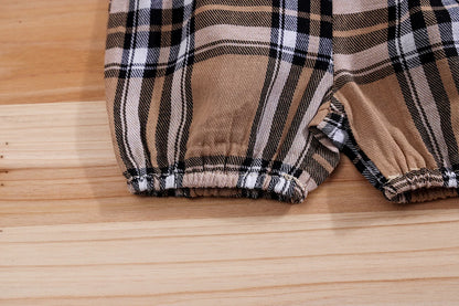 Close up detail of baby boys plaid bear bodysuit & trousers set