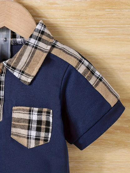 Close up detail of baby boys plaid collared summer outfit