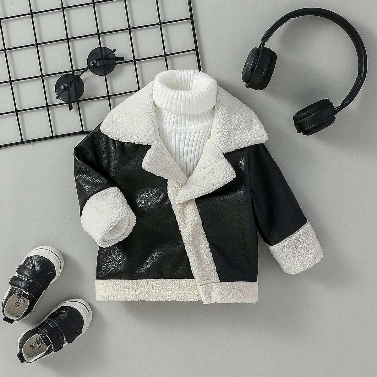 Baby boys black leather-look winter jacket with a turn-down collar