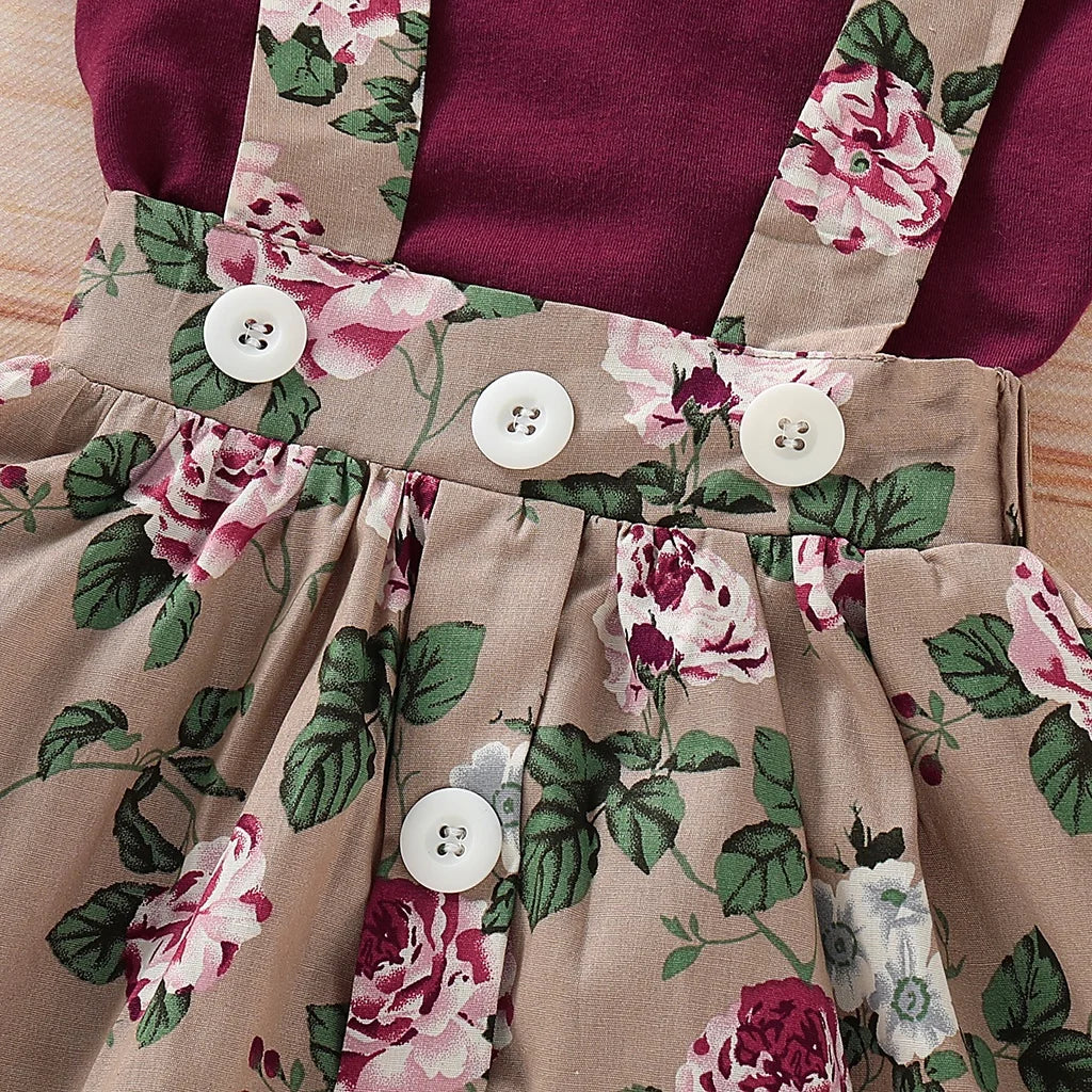 Different colour variation or layout view of the baby girls christmas floral romper and suspender skirt set