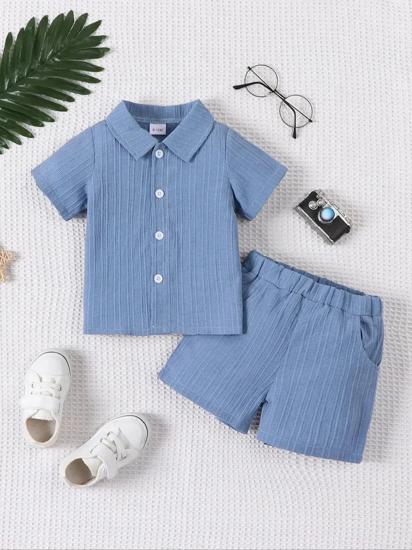 Occasion style layout showcasing the baby boys woven jacquard shirt and shorts set