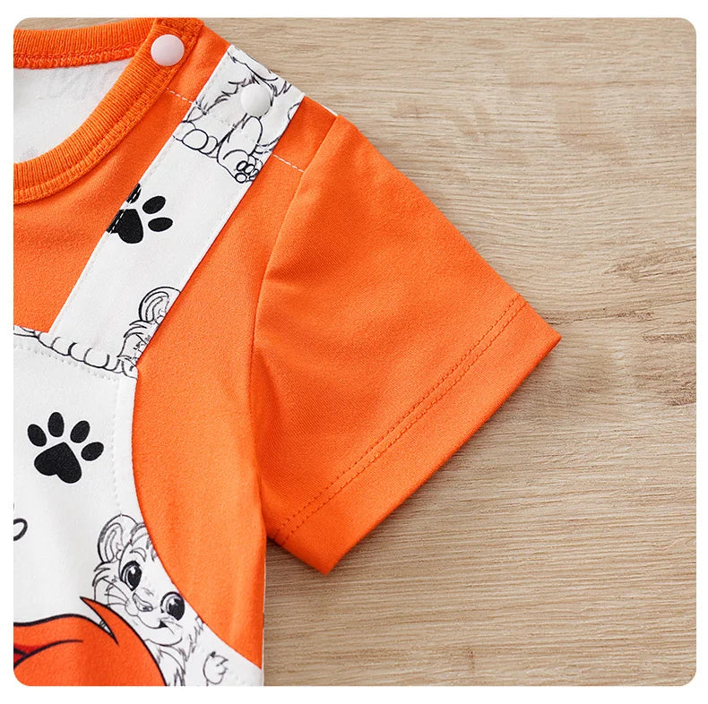 Baby wearing a short-sleeve romper with a lion print and faux two-piece design