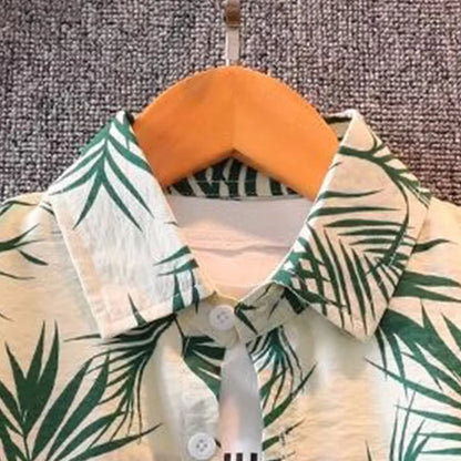 Design features and details on the boys floral beach shirt and shorts set - view 4