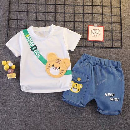 Occasion style layout showcasing the boys cartoon bear t-shirt and shorts set