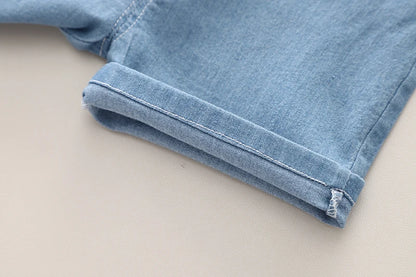 Pattern and styling on the boys striped shirt and denim shorts set - view 14