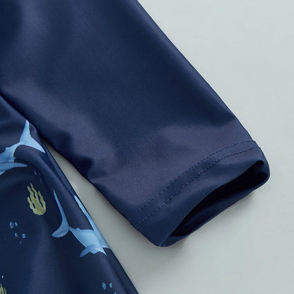 Detail shot of the Sky Blue boys shark print long sleeve rash guard swimwear set