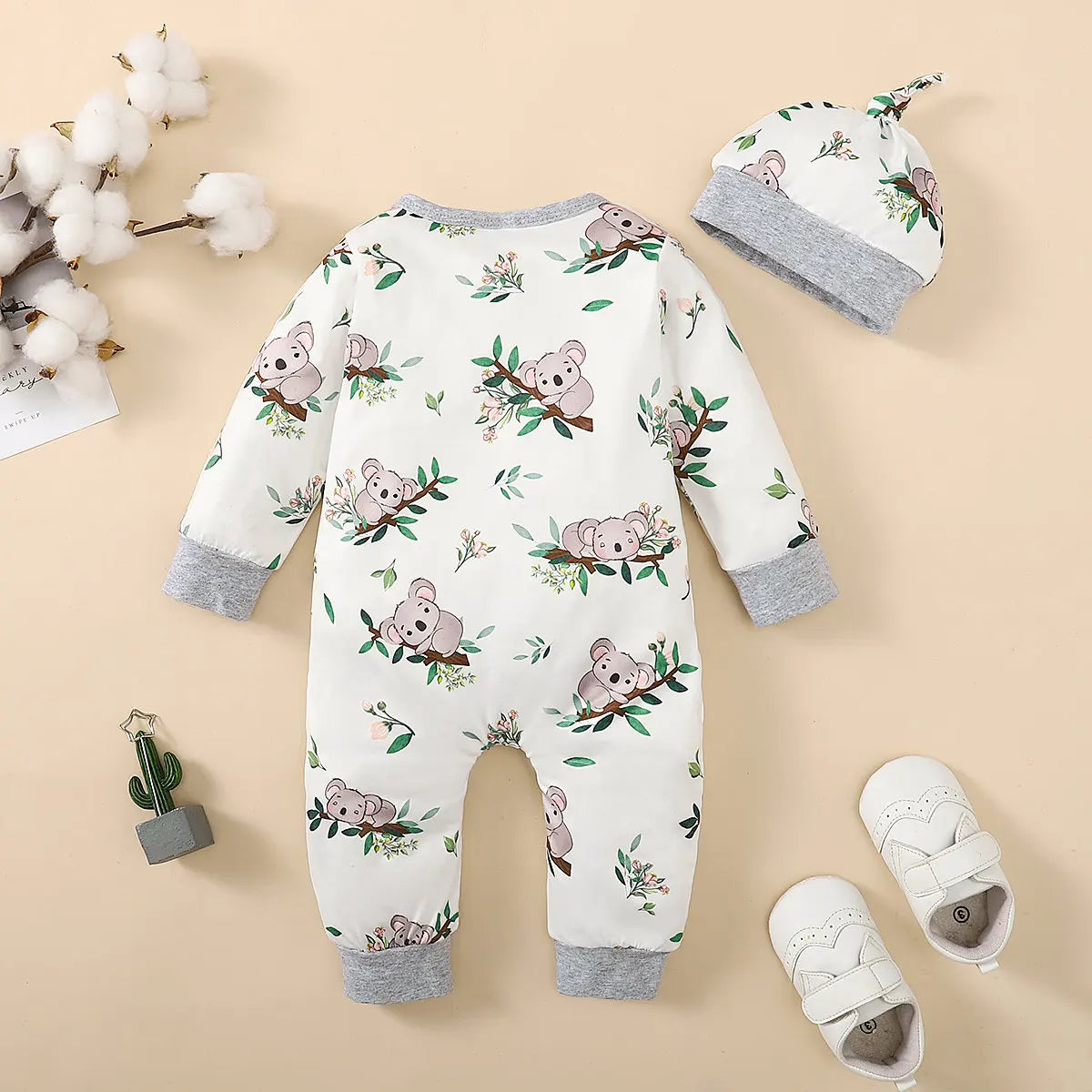 Alternative angle of baby boys bear print button-up winter romper