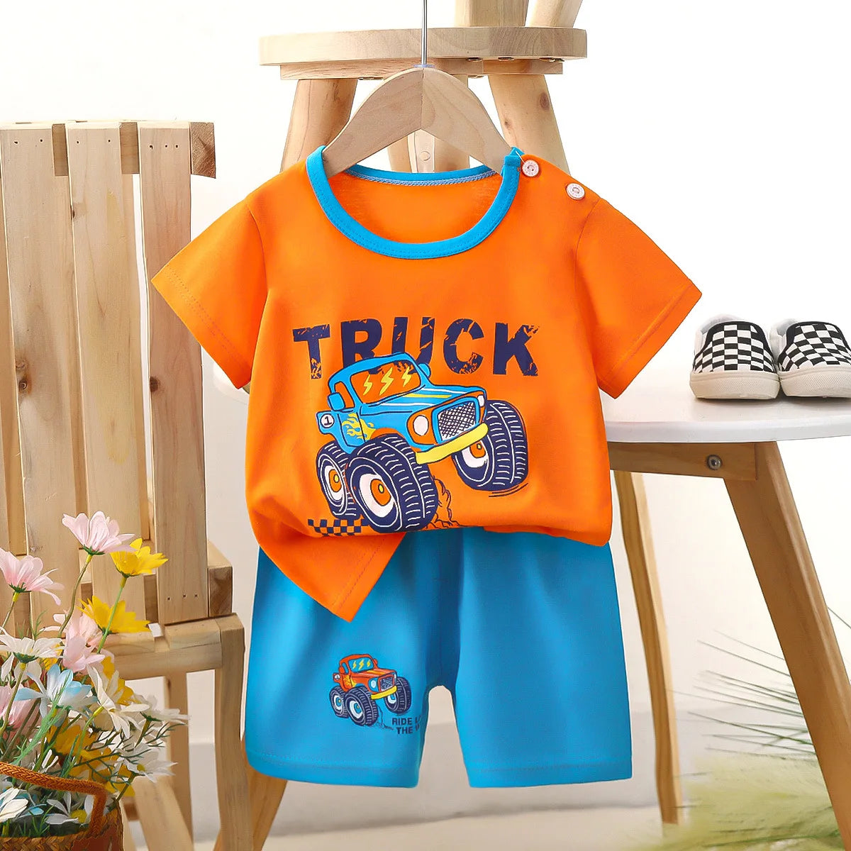 Boys two-piece summer outfit featuring a cotton T-shirt and matching shorts