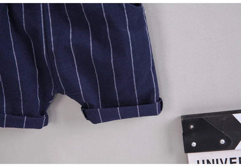 Style angle showing the boys short sleeve shirt and shorts set - view 23