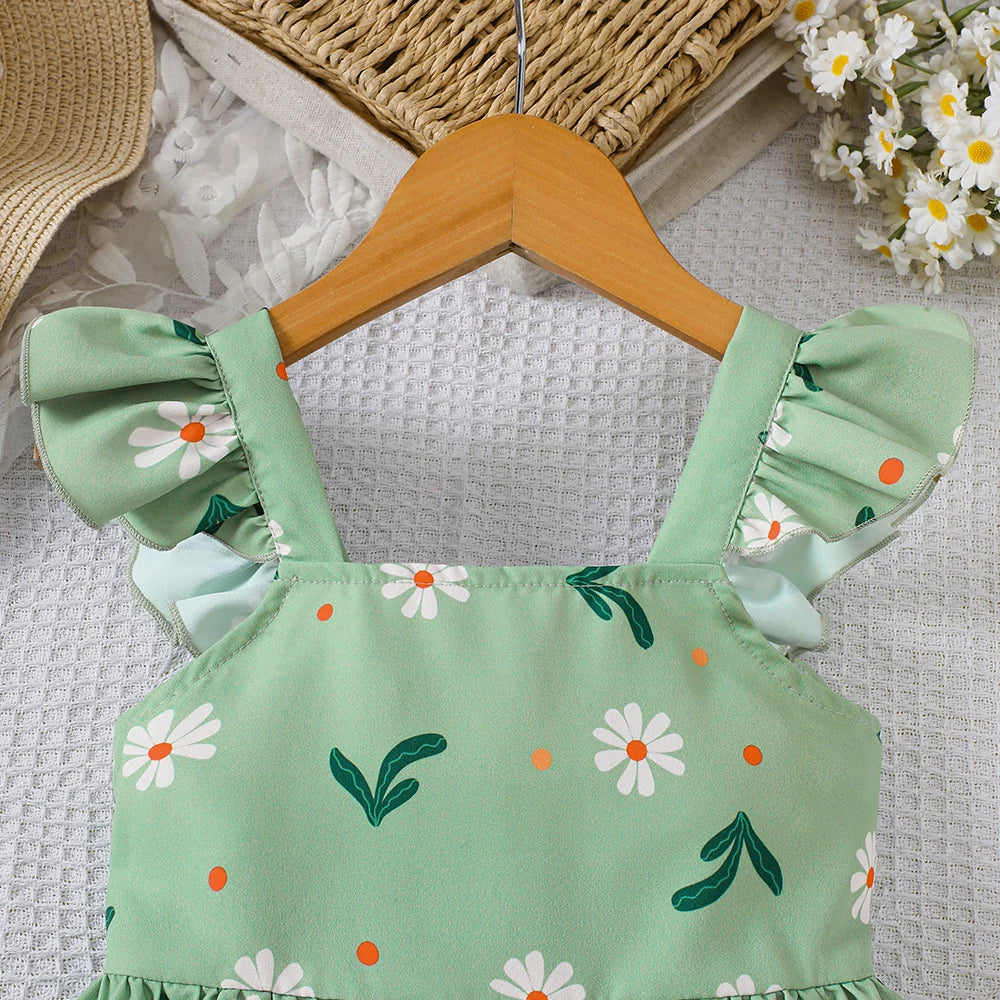 Styling option and alternate perspective of the girls botanical print flutter sleeve dress