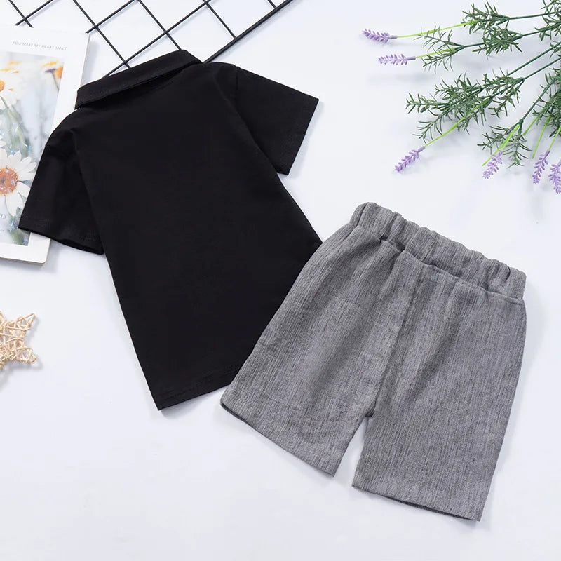 Design features and details on the boys short sleeve shirt and shorts set - view 4