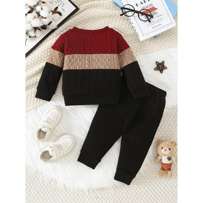 Side view of boys colour block long sleeve top & pants