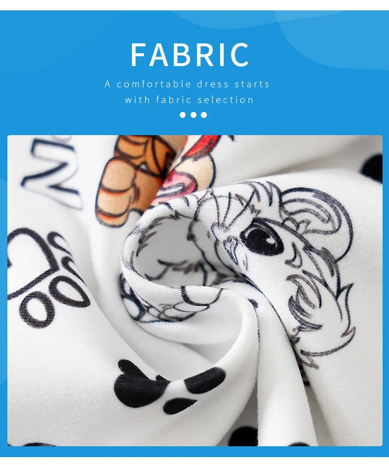 Baby wearing a short-sleeve romper with a lion print and faux two-piece design