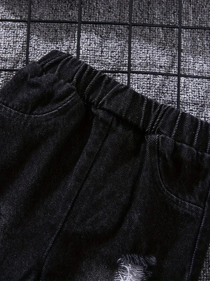 Back view of boys tartan polo shirt & denim trousers set
